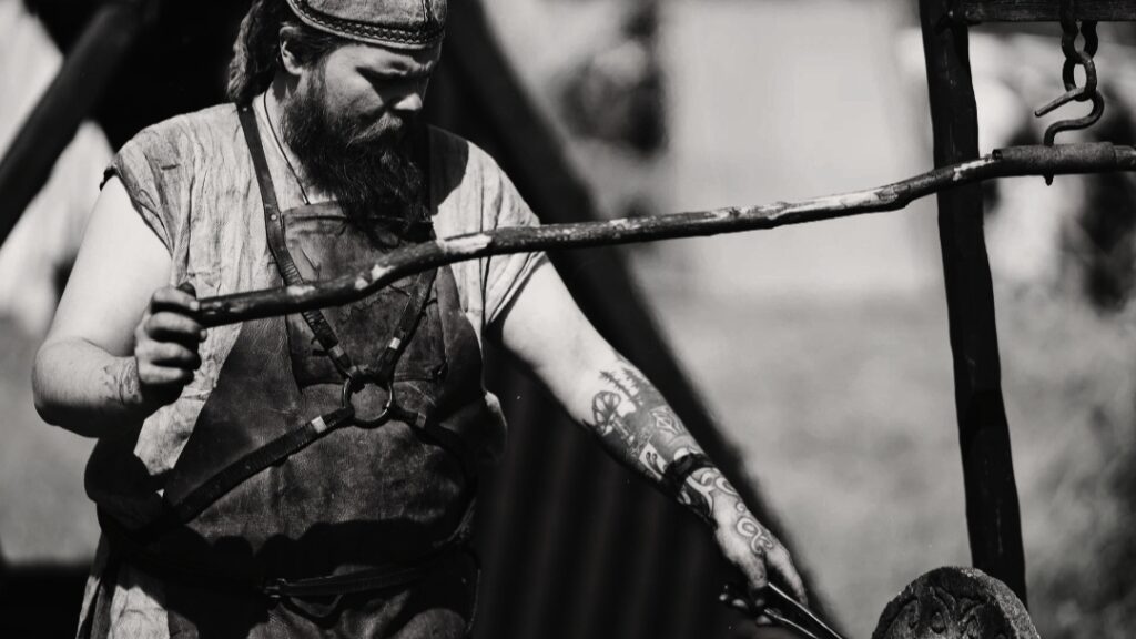 Blacksmith Leevi Kaski working at the forge.